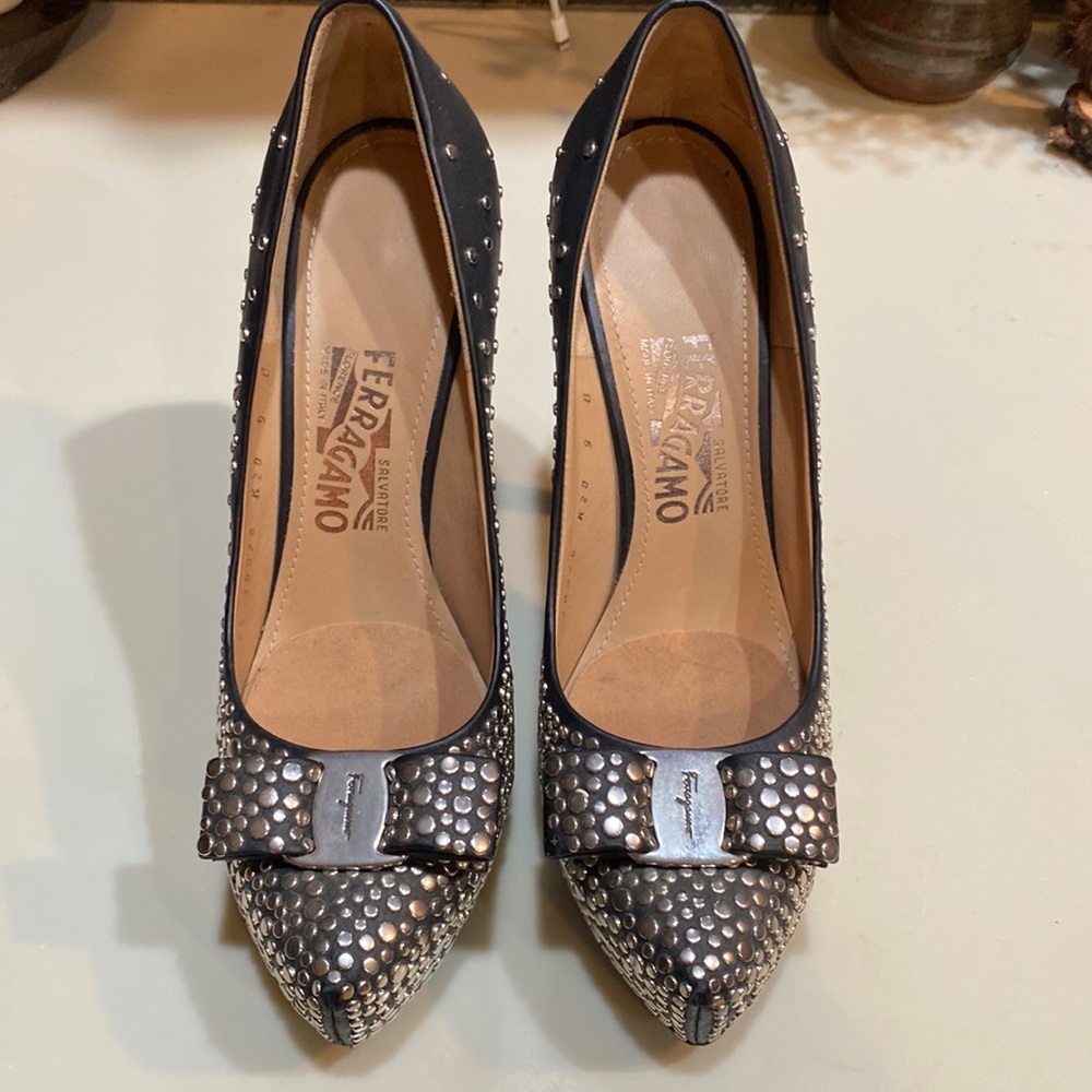 Salvatore Ferragamo black leather stilettos with silver stud detail. Fits like 8